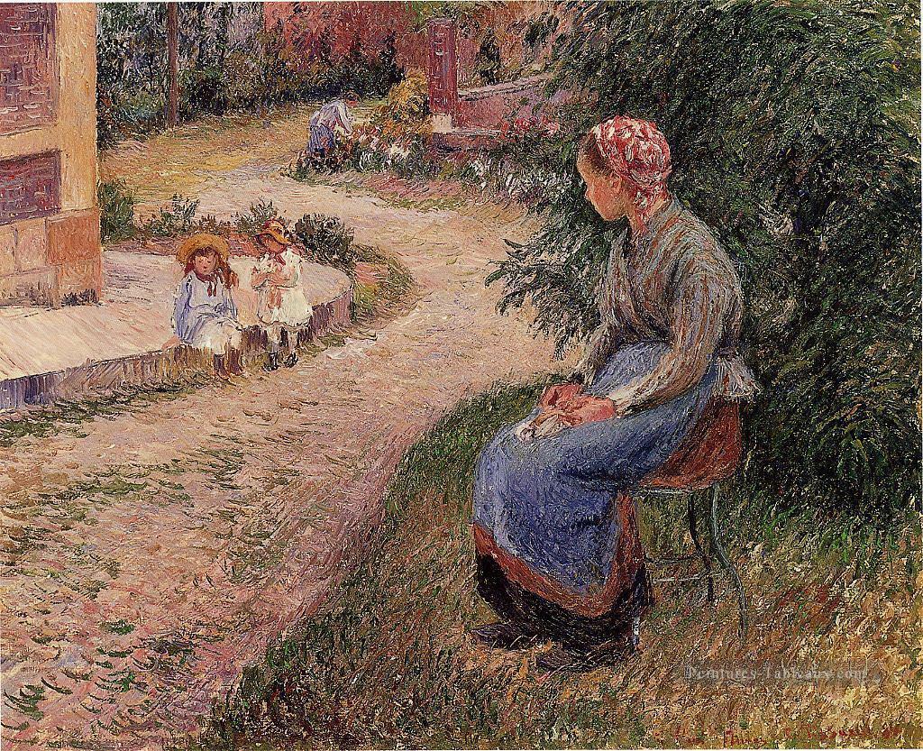 une servante assise dans le jardin d’eragny 1884 Camille Pissarro Peintures à l'huile